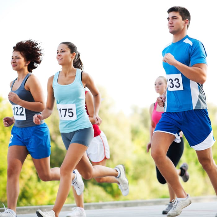 A group of runners in a cross country race.